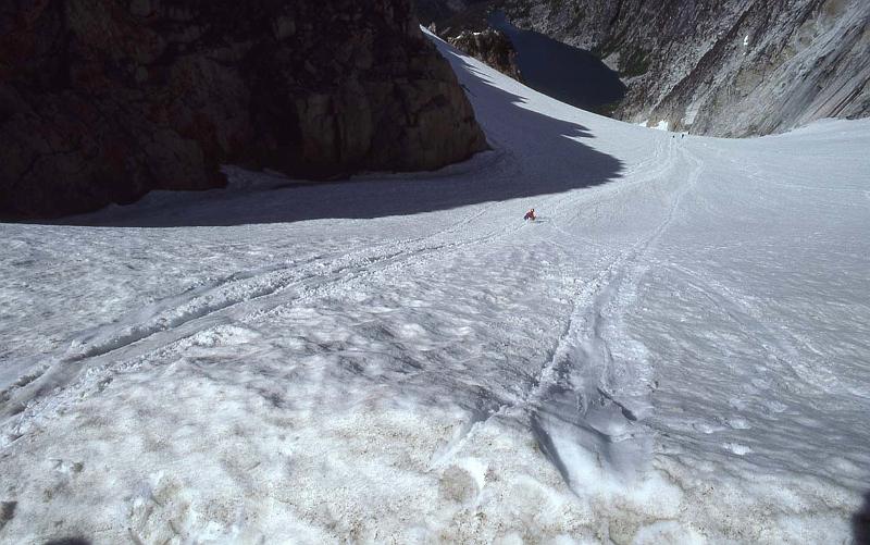 1988-037 Colchuck Pk N Buttress Jul 1988 013 Glissading to Colchuck Lake.jpg